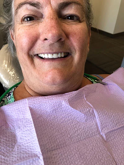 patient smiling after a cosmetic dentistry procedure at Desert Sage Family Dental in Phoenix, AZ